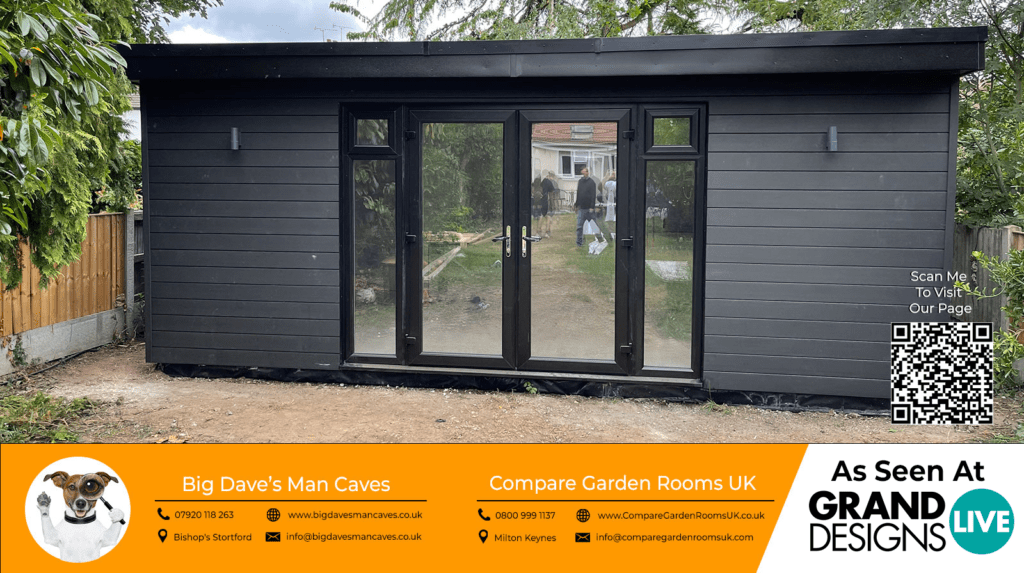 light grey garden room with black french doors