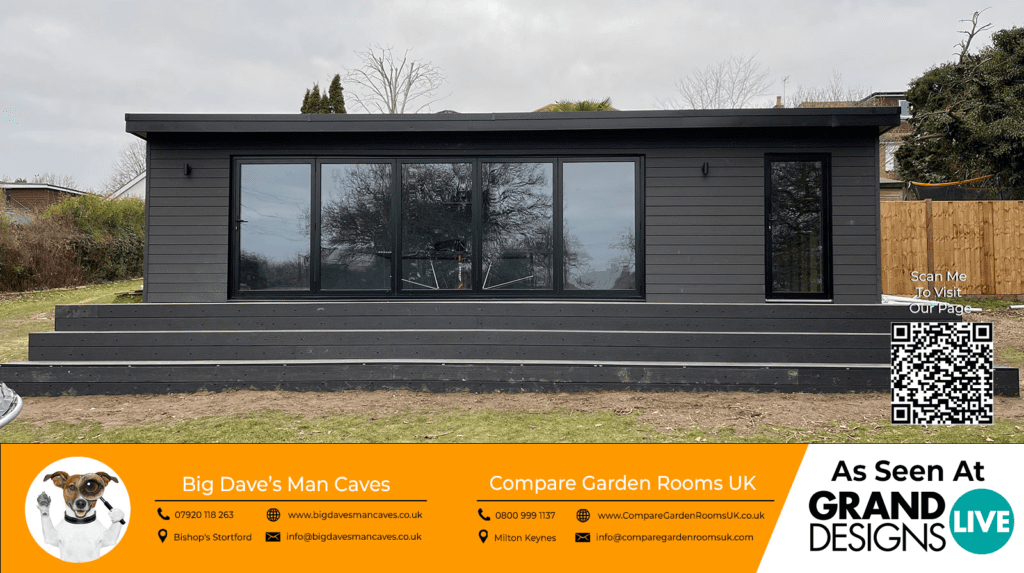 light grey garden room with black sliding doors