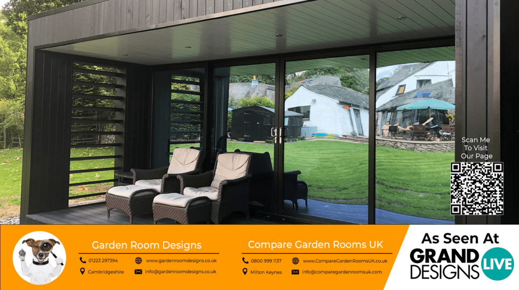 outdoor view of a beautiful garden room with black sliding doors and outdoor furniture