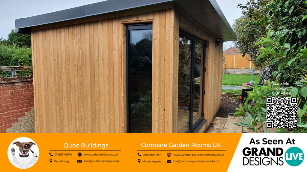 oak garden room with dark grey bi folding doors